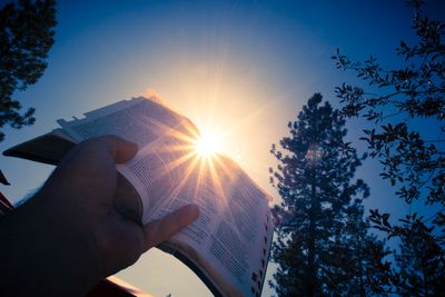 man holding a bible